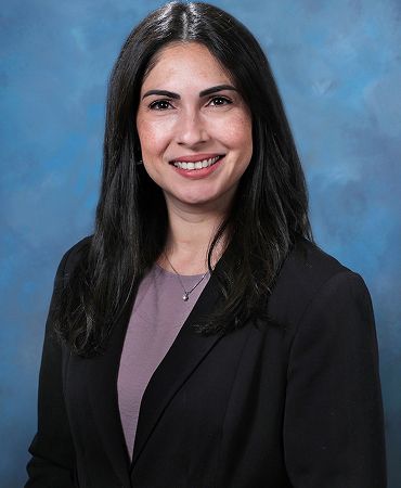 Professional portrait of a confident woman.