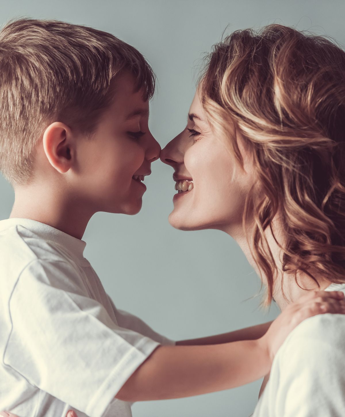 Mother and child sharing a joyful moment together.