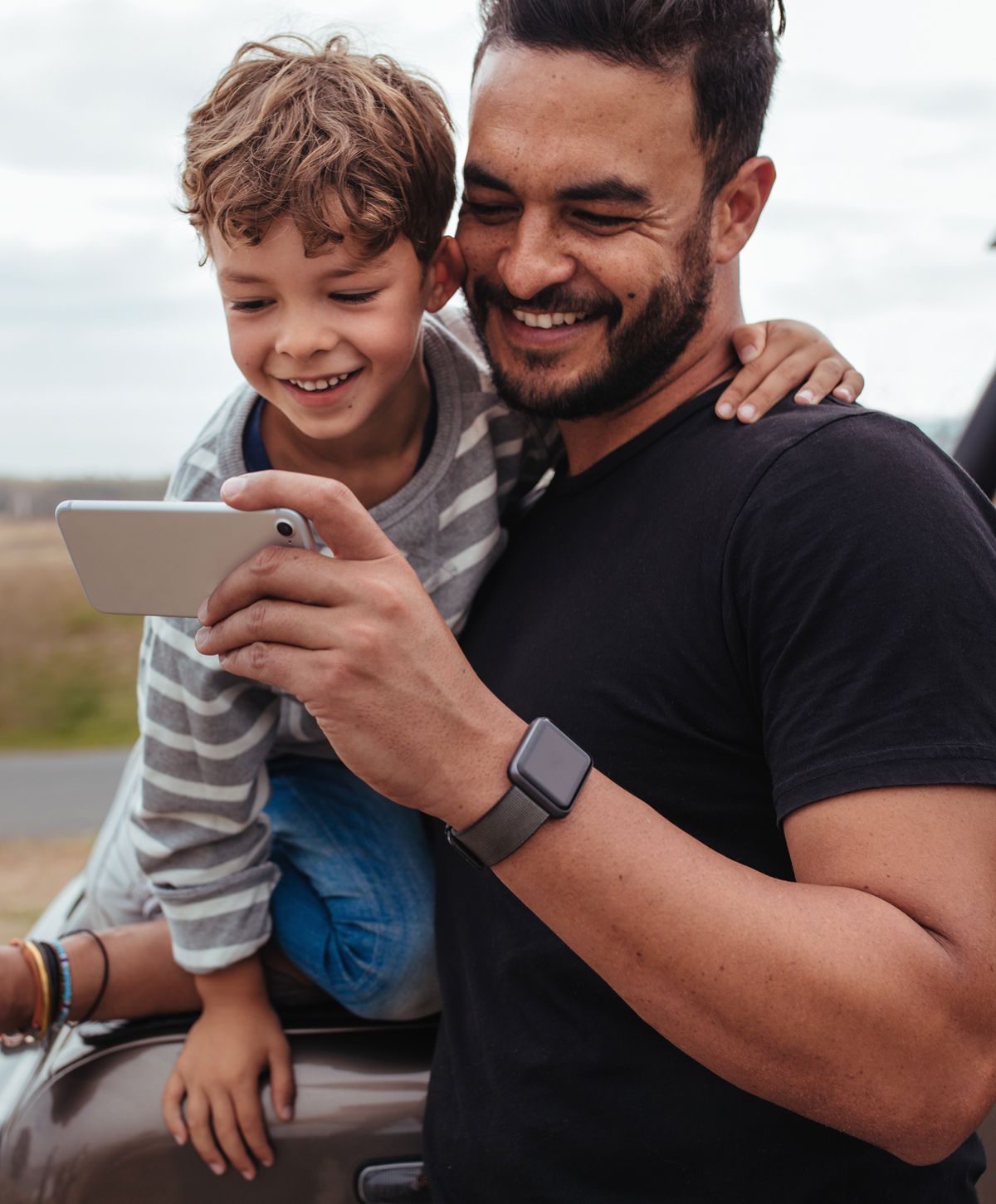 Father and son enjoying time together outdoors.