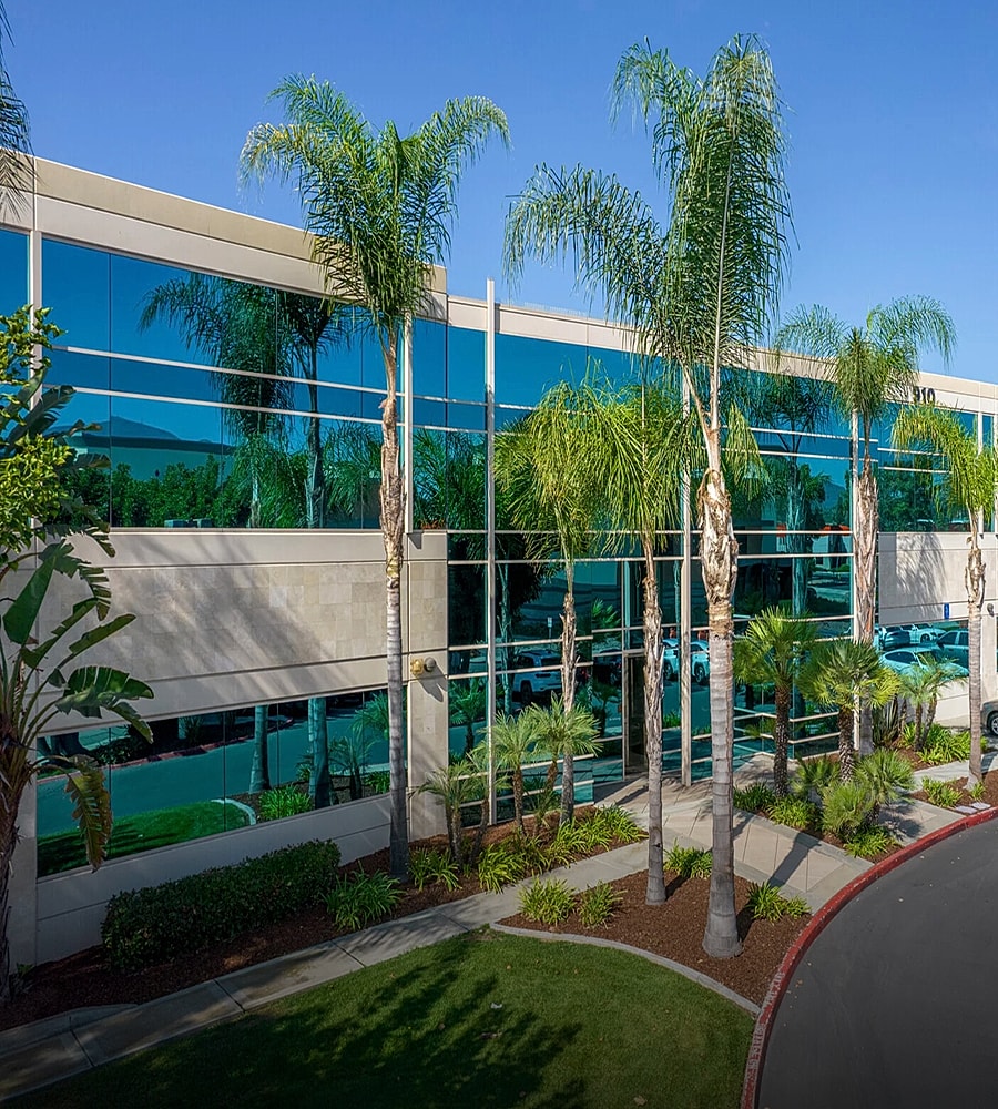 Sunset over tranquil lake and mountains.