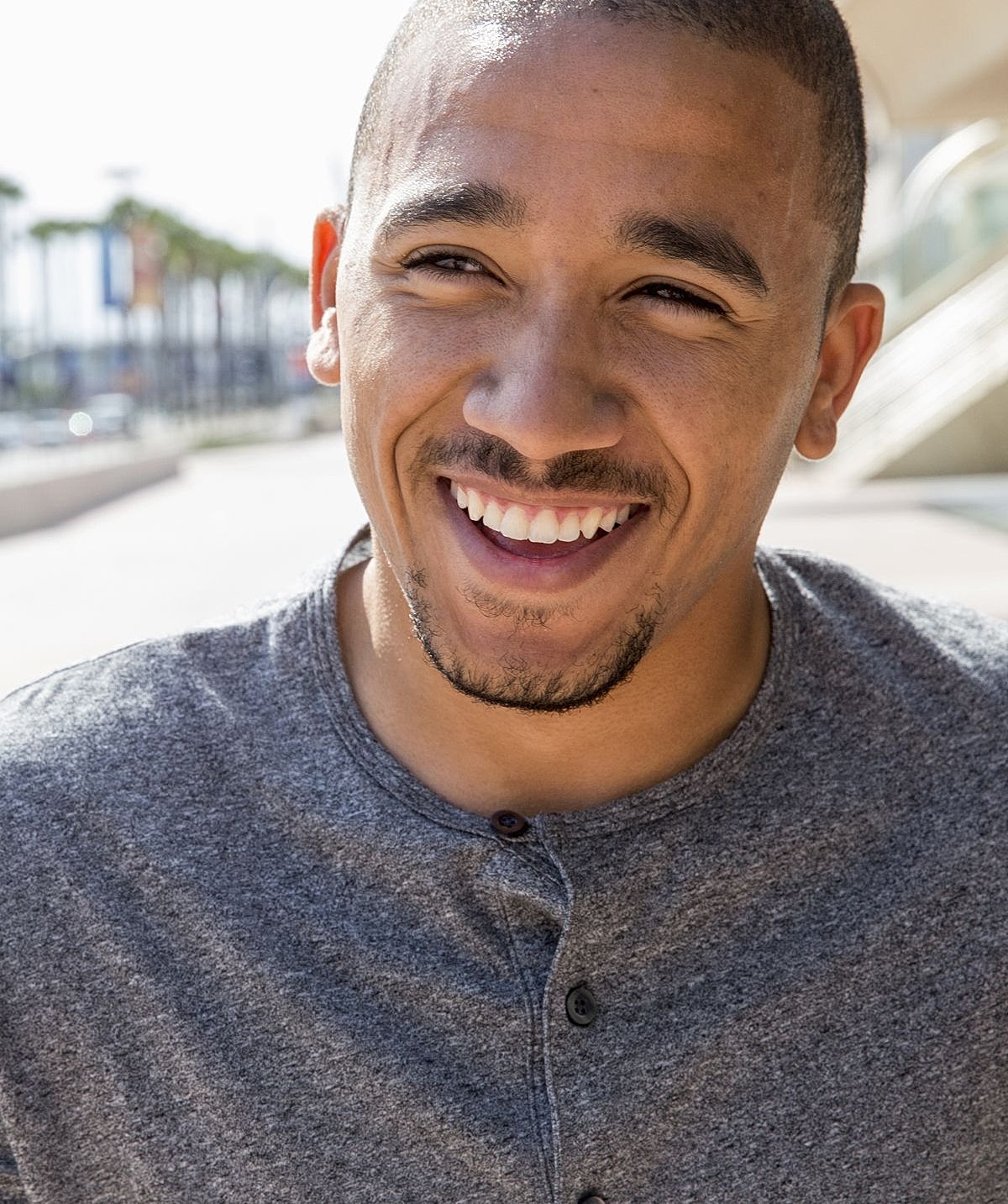 Women practicing yoga on the beach.