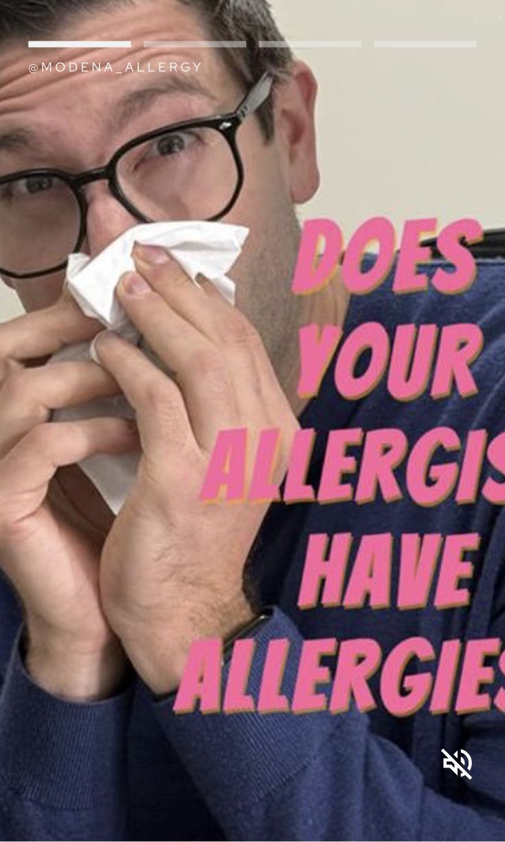Man sneezing with tissue, asking about allergies.