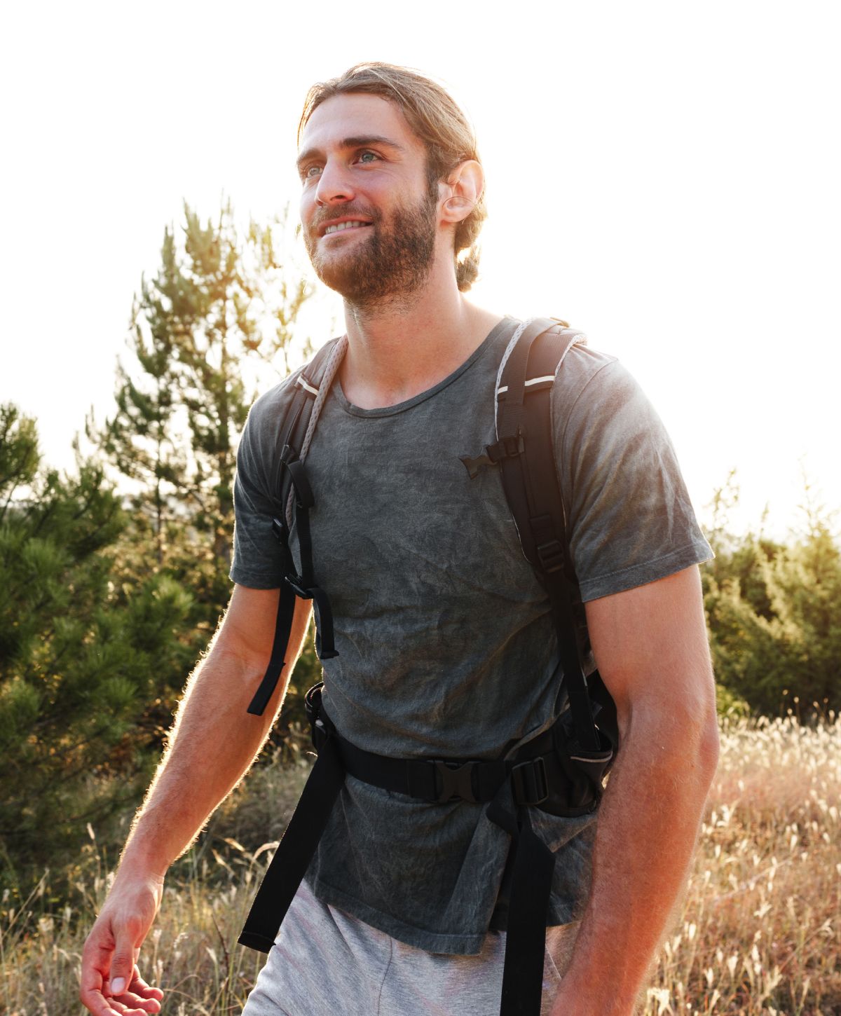 Hiker enjoying the outdoors at sunset.