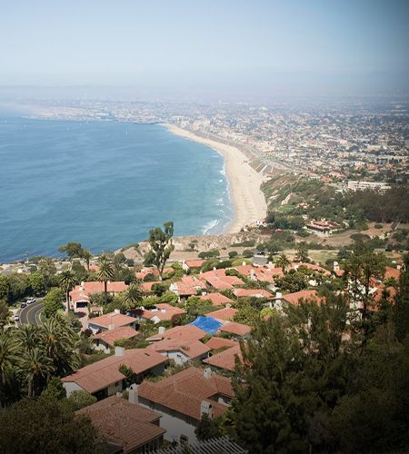 Coastal view overlooking city and shoreline.