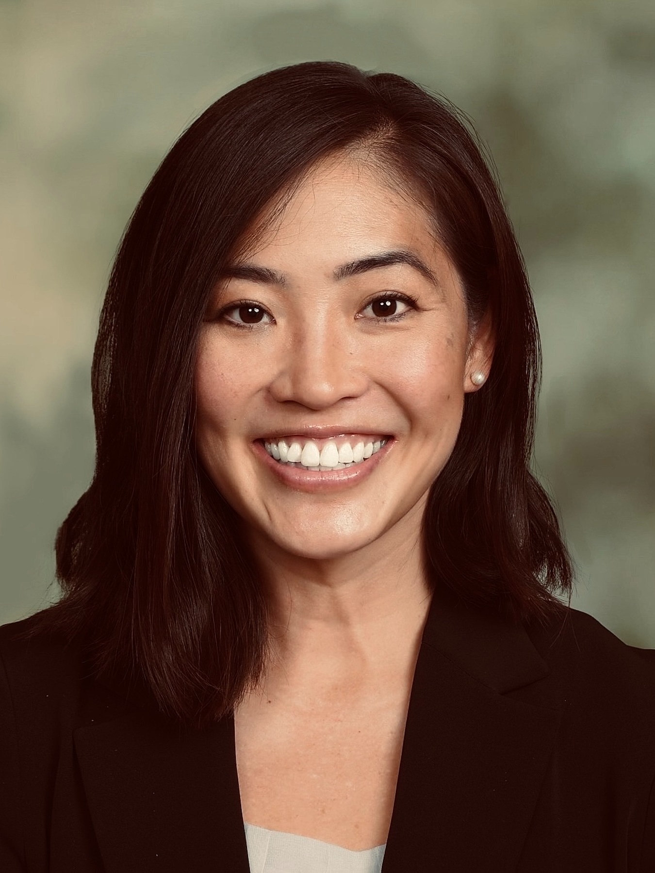 Dayna Miyashiro, MD Smiling in black jacket